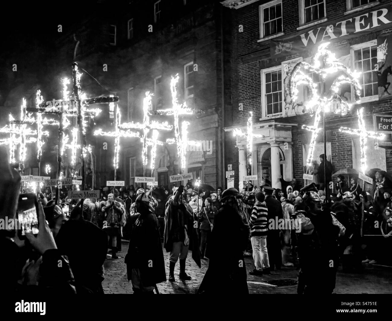 Flaming torch during parade at Lewes Bonfire celebration, November 2022 Stock Photo