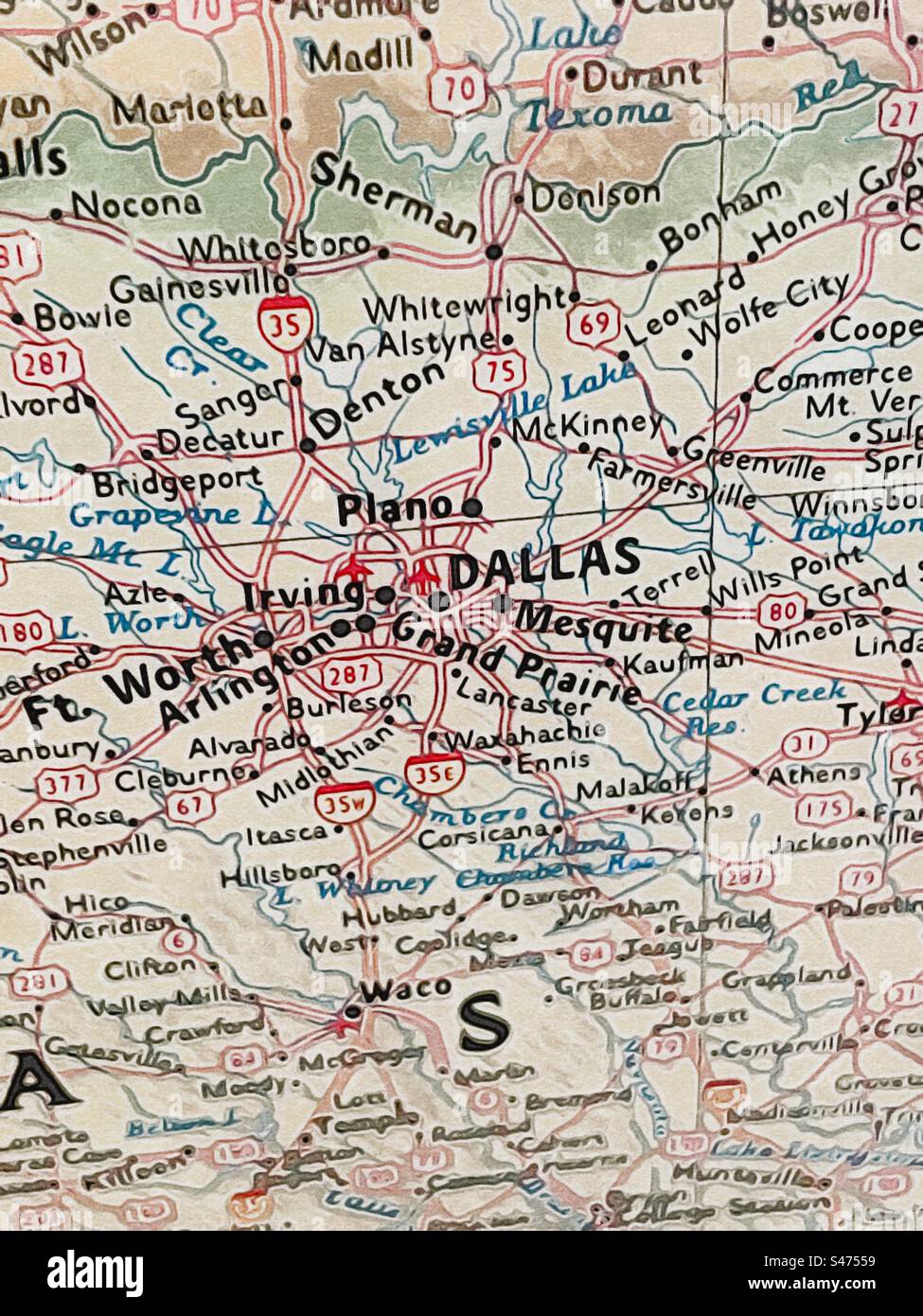 Zoomed image of the Dallas, Texas area on a US map. Original photo has been made into an “illustration” via the IOS app Brushstroke. Stock Photo