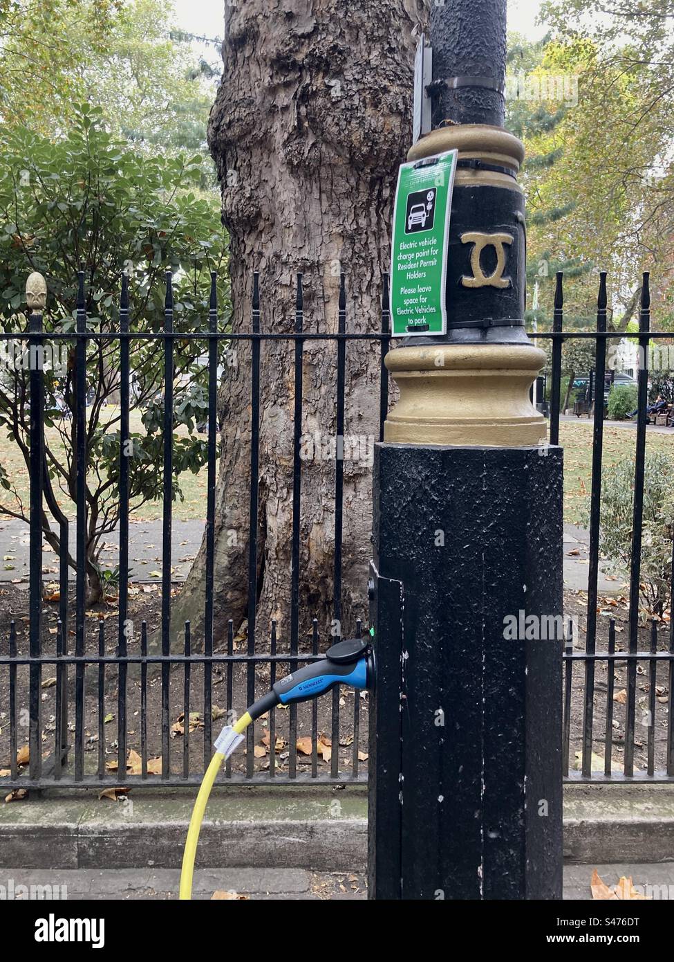 Electric vehicle charging point in a lamppost, Soho, London - Smartphone Captured Stock Image