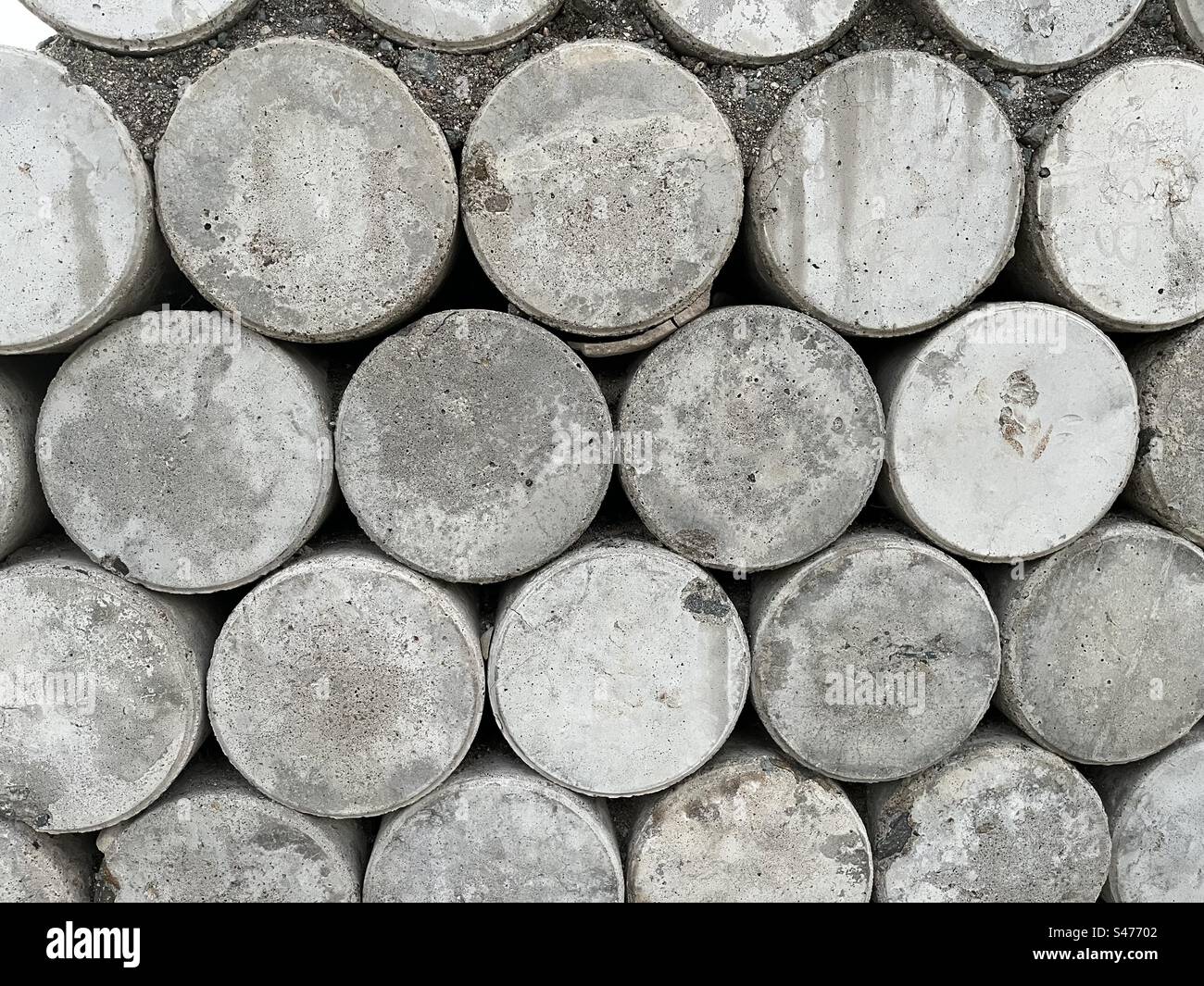 Cement wall of round cylinder brick Stock Photo Alamy