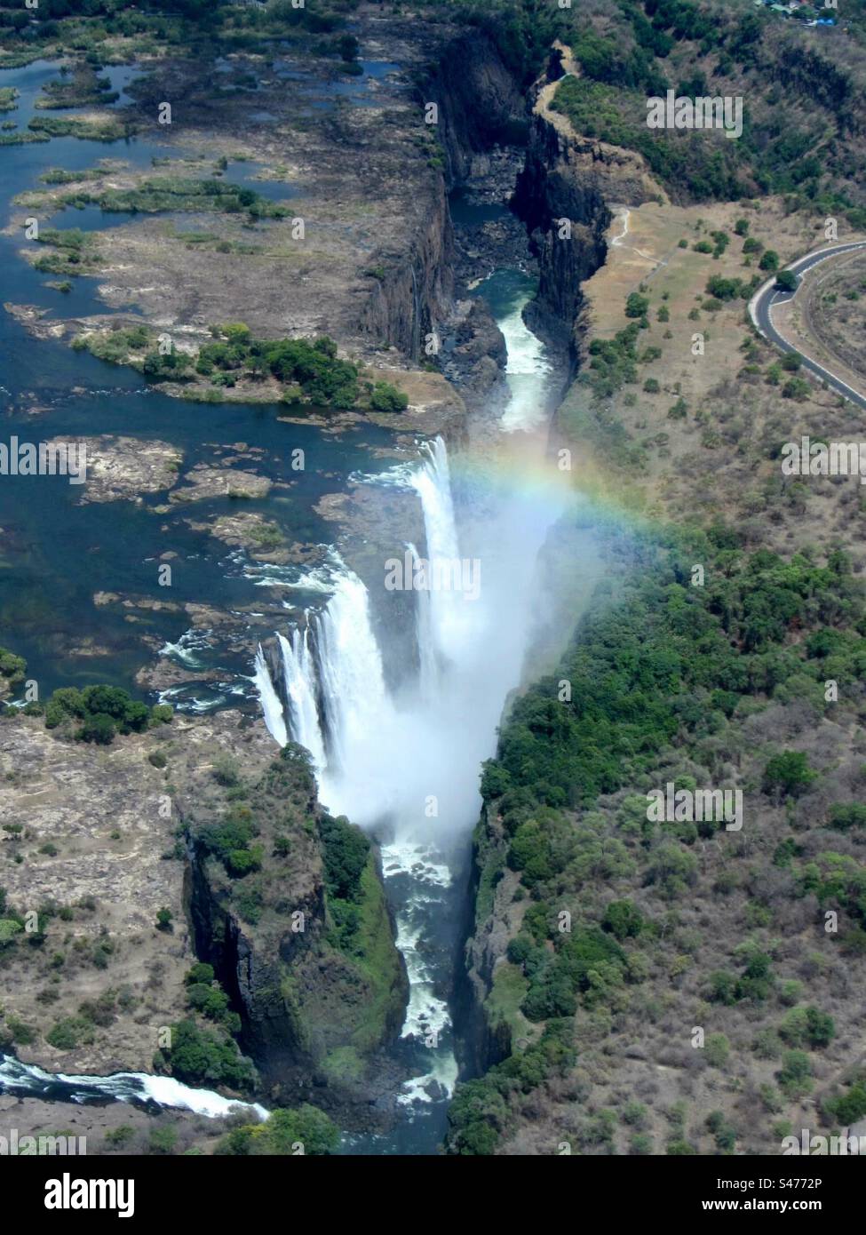 Rainbow over Victoria Falls on the Zambezi River in Africa - Smartphone Captured Stock Image