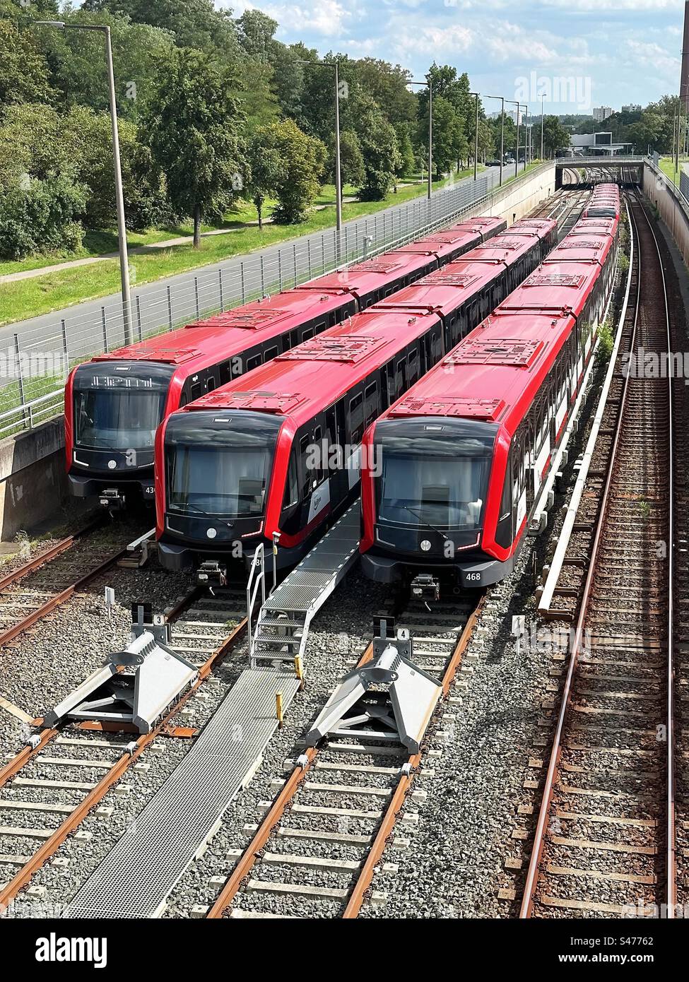 Red subway trains outside - Smartphone Captured Stock Image