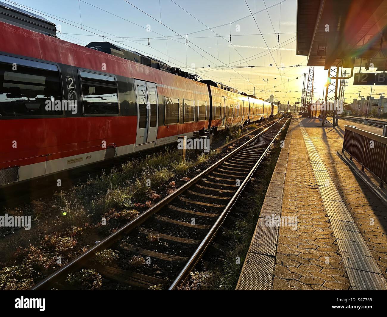 Sunrise at railway station - Smartphone Captured Stock Image