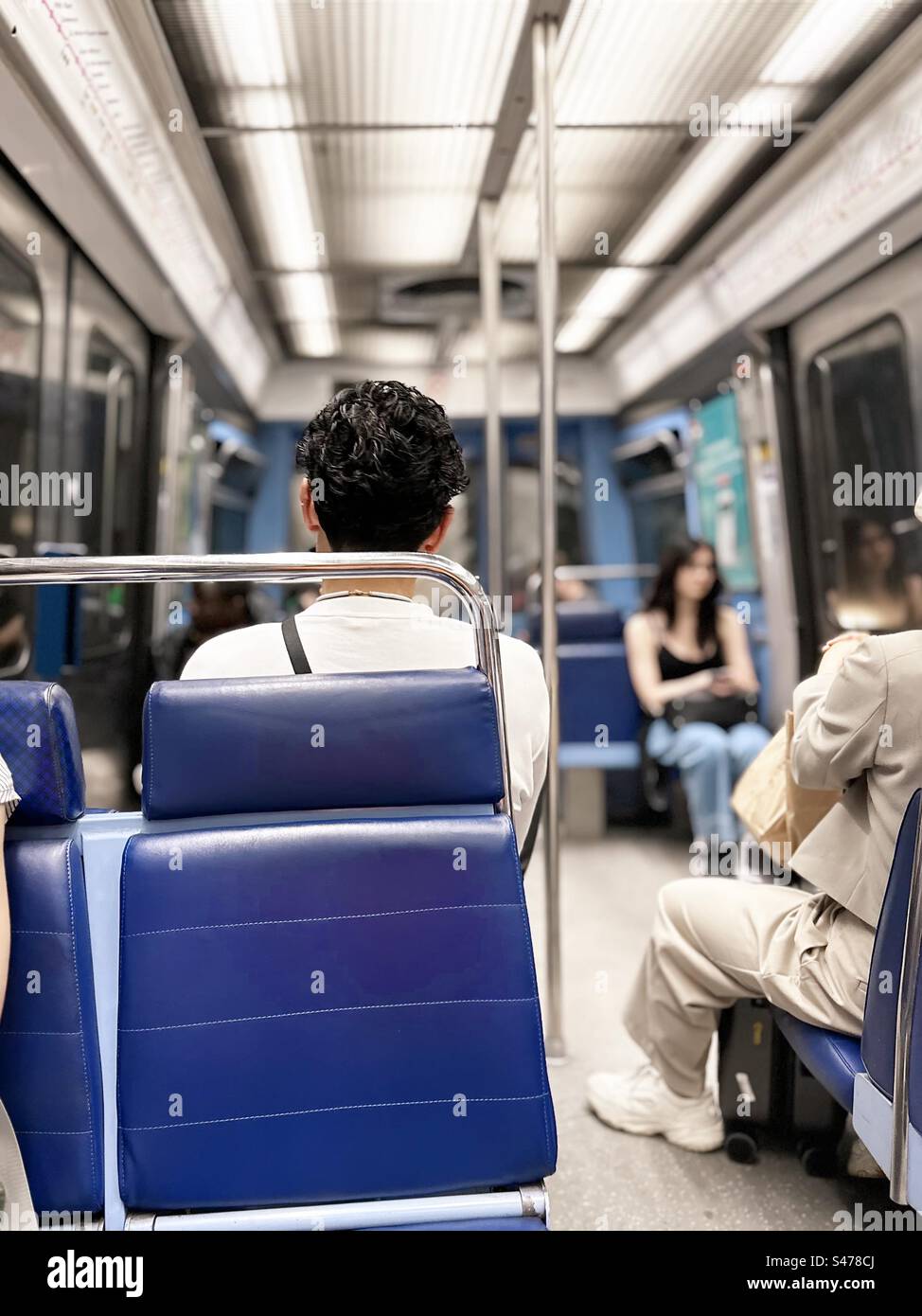 People in Subway train - Smartphone Captured Stock Image