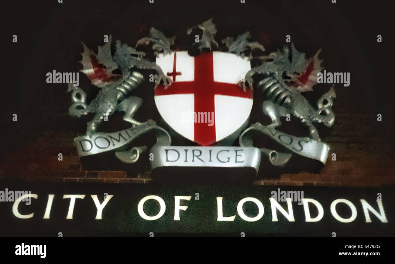 The coat of arms of the City of London with motto Domine dirige nos, translates as 'Lord, direct (guide) us'. The shield has a Red Cross - St George - and sword represents martyr St Paul. - Smartphone Captured Stock Image