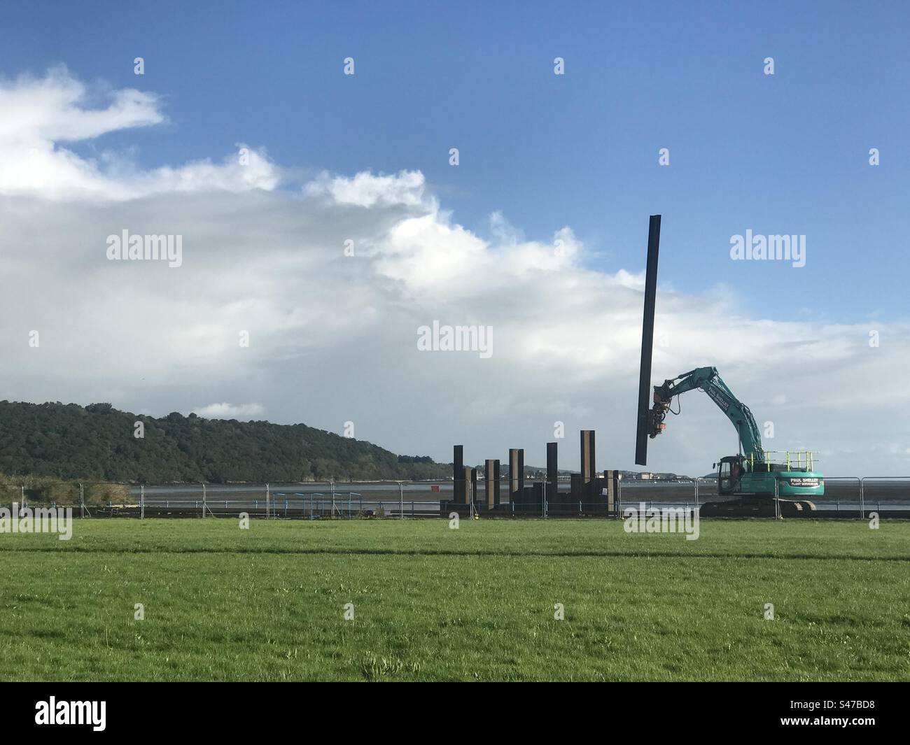 Flood defense construction. North Wales coast At Bangor Gwynedd Looking towards the Menai Straits and Anglesey September21st 2023 - Smartphone Captured Stock Image
