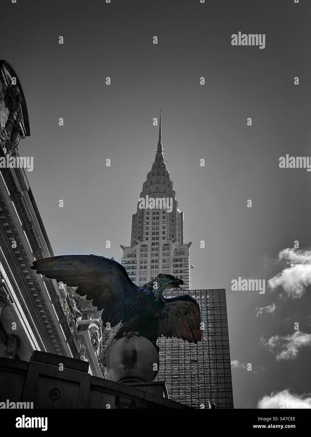 Eagle statue at Grand Central Station in New York City with the Chrysler Building in the background - Smartphone Captured Stock Image