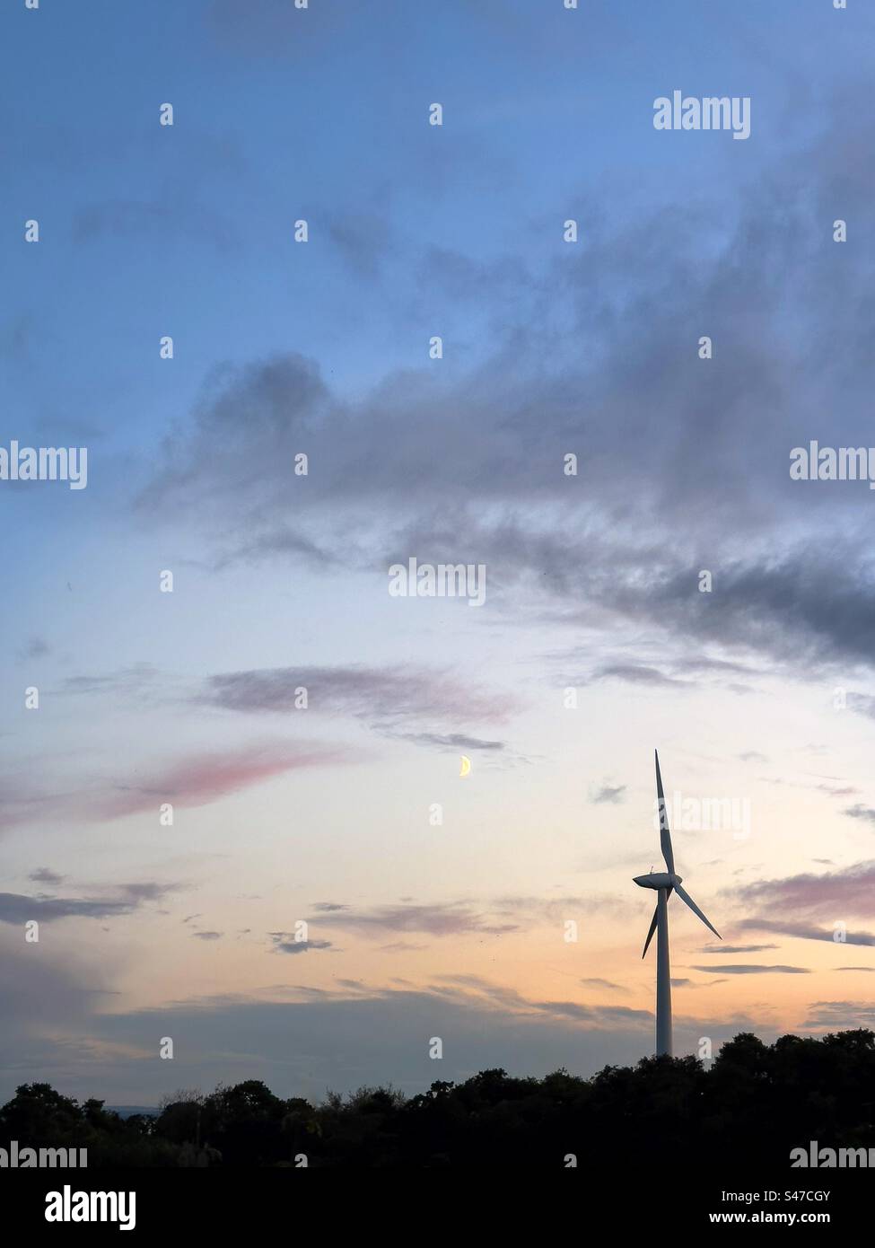 Wind turbine and the moon Stock Photo - Alamy
