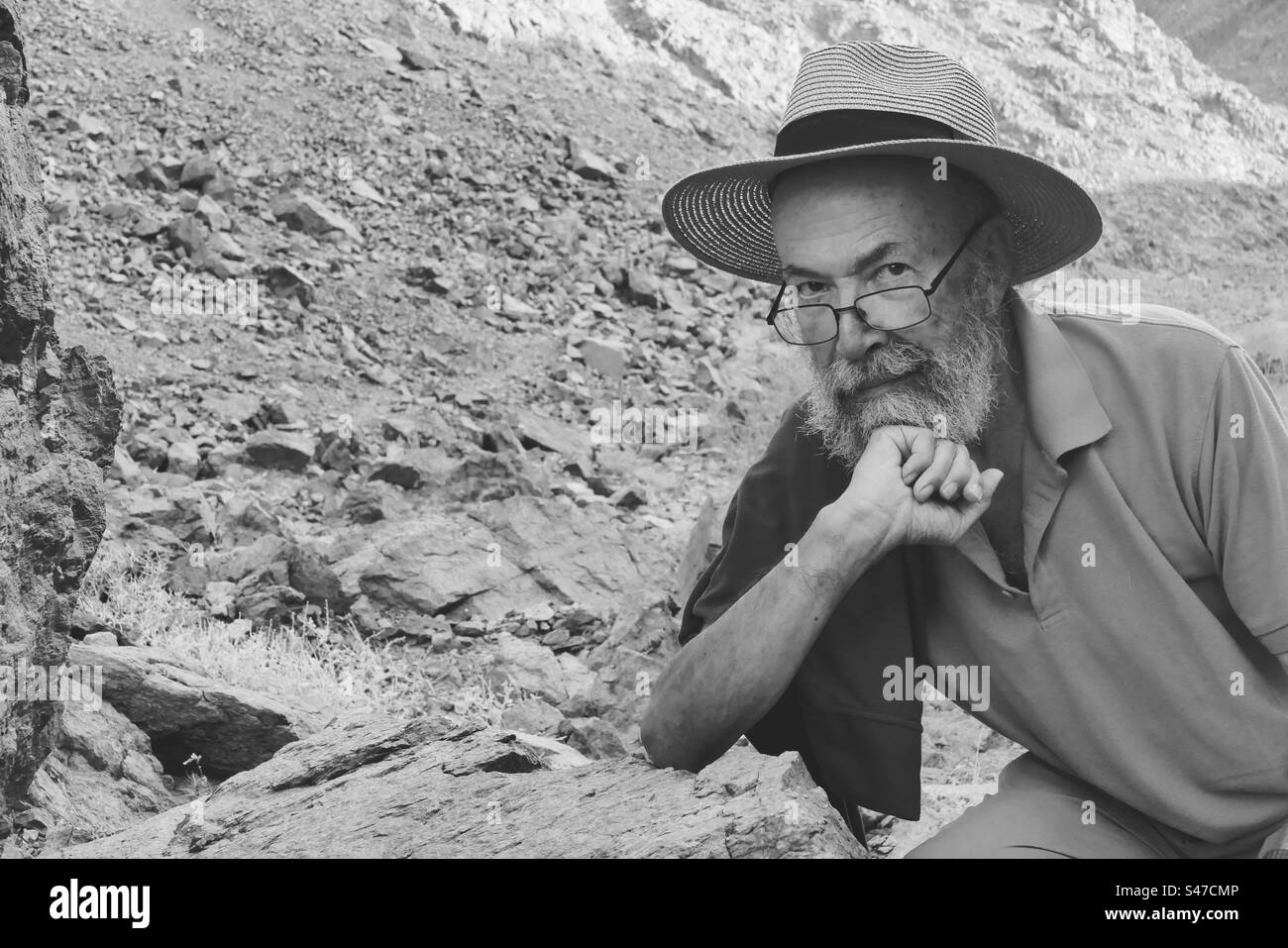 Monochrome Portrait of senior man at desert Stock Photo