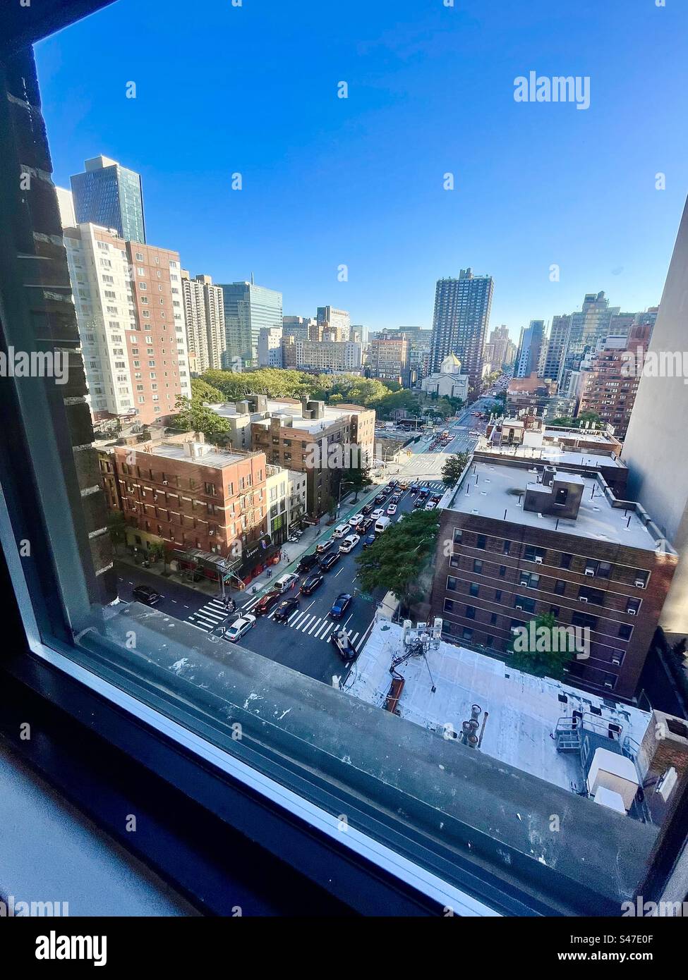 Window view of New York City on a clear Day - Smartphone Captured Stock Image