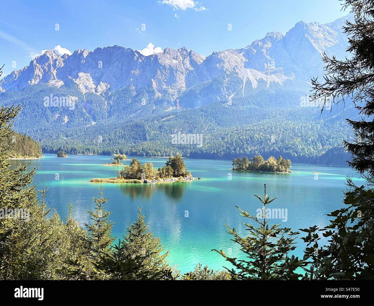 Beautiful islands in front of alpine mountains background - Smartphone Captured Stock Image