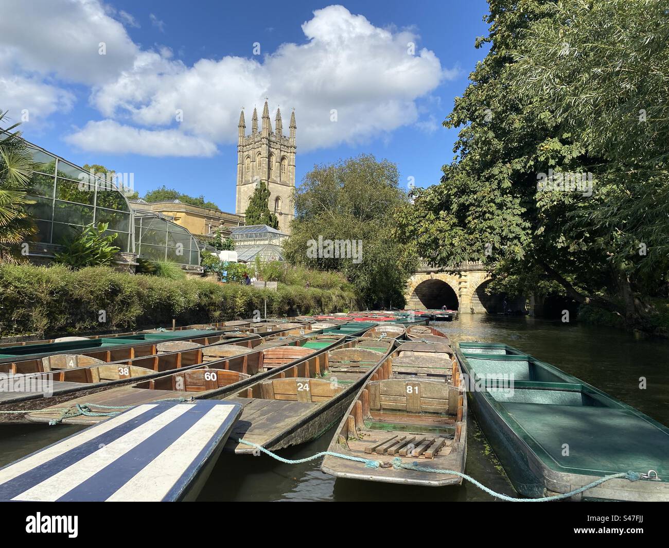 Punts on the River Thames at Magdalen college Oxford - Smartphone Captured Stock Image Punts on the River Thames at Magdalen college Oxford - Smartphone Captured Stock Image