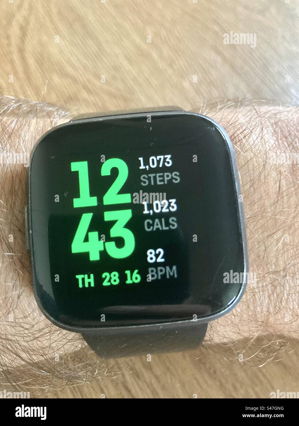 Fit bit smart watch - Smartphone Captured Stock Image