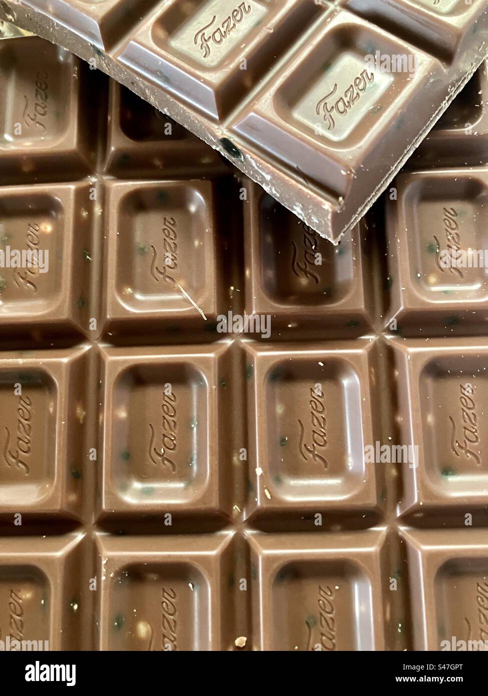 Milk chocolate with liquorice dragee - Smartphone Captured Stock Image