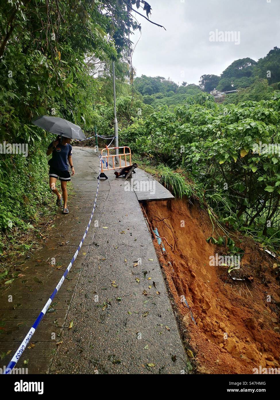 Destroyed roads o Lamma islands after heavy rains in Hong Kong. - Smartphone Captured Stock Image