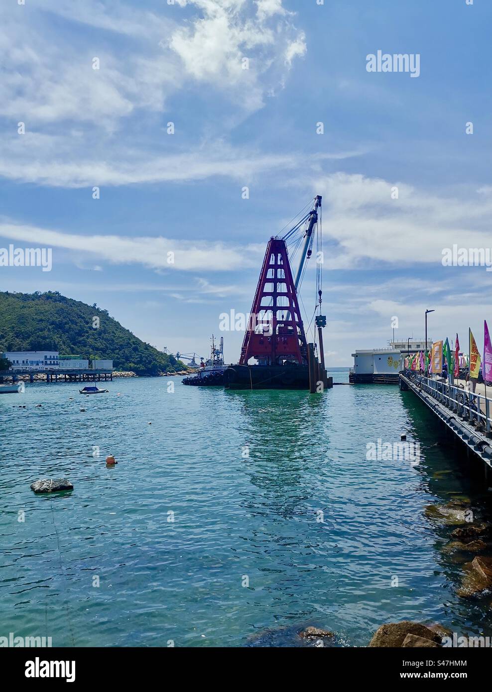 September 2023, Yung Shue Wan, Lamma Island, Hong Kong. Work on a new pier begins. - Smartphone Captured Stock Image