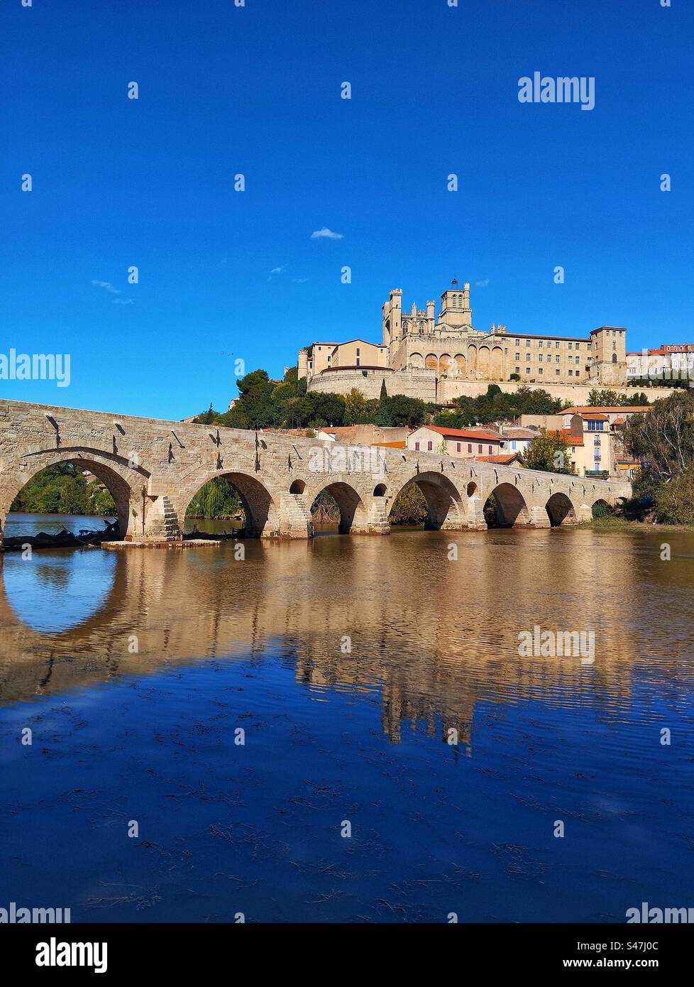 The Old Bridge and the St Nazaire Cathedral in Beziers. Occitania, France - Smartphone Captured Stock Image