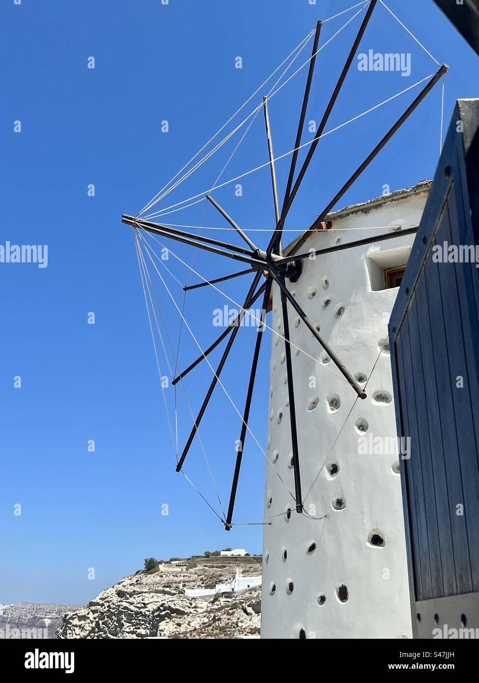 Windmill against a blue sky, Megalochori - Smartphone Captured Stock Image