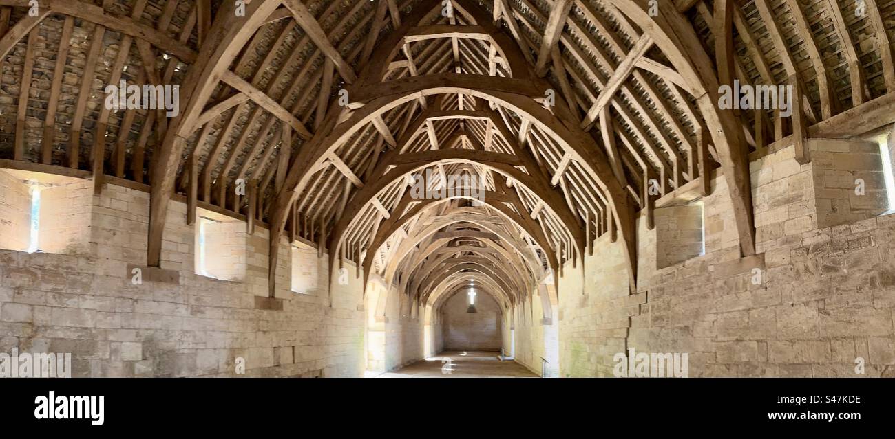 A panoramic view of the timber roof of the magnificent Tithe barn at Bradford on Avon. - Smartphone Captured Stock Image
