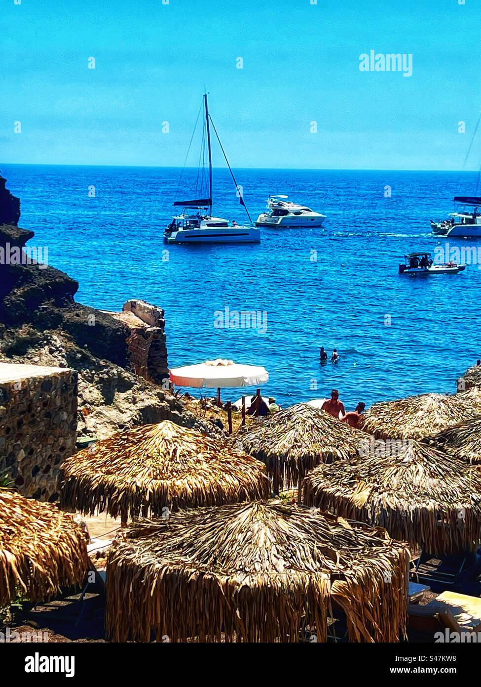 Kaminia Beach, Santorini, on a hot August day. - Smartphone Captured Stock Image