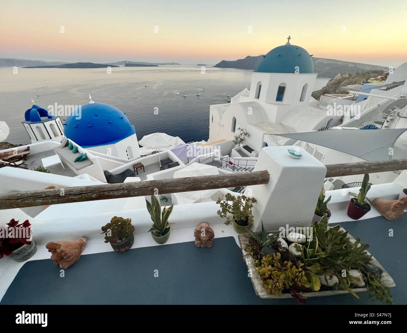 Resurrection of the Lord church, Saint Spyridon church, and bell tower are infamous for their blue domes. - Smartphone Captured Stock Image
