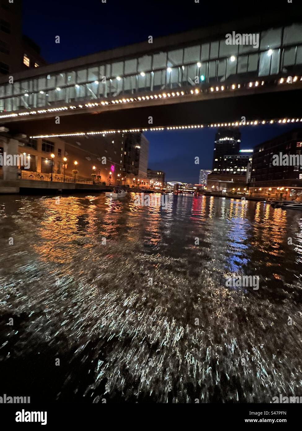 Milwaukee River and downtown at night as seen from a boat Stock Photo