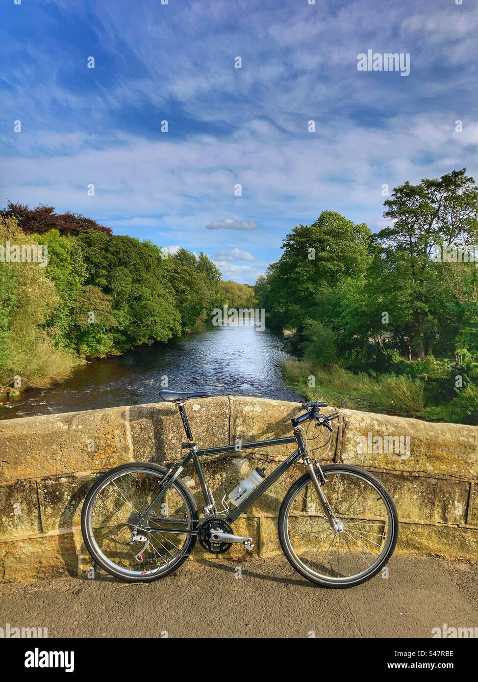 Pace RC200 F5 retro mountain bike on the old bridge over the river Wharfe in Ilkley West Yorkshire - Smartphone Captured Stock Image