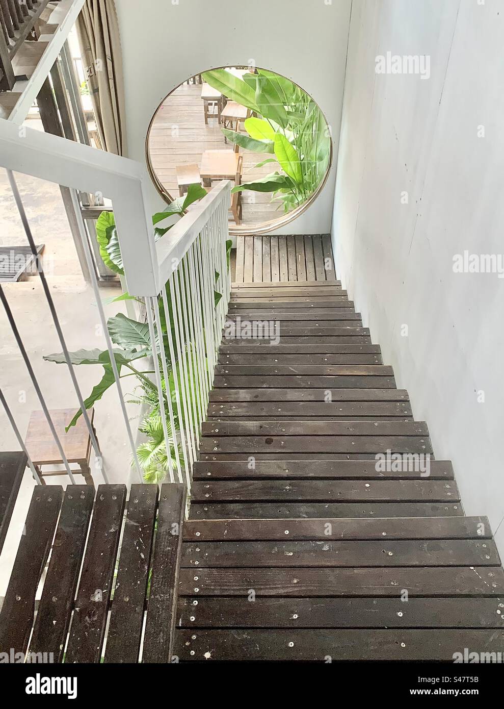 Stair case and a round window design - Smartphone Captured Stock Image Stair case and a round window design - Smartphone Captured Stock Image