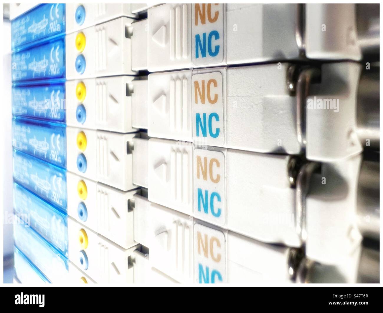 Close up of industrial pneumatic solenoid valve station. - Smartphone Captured Stock Image