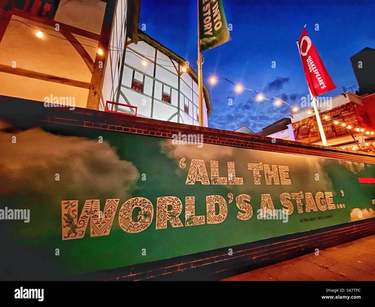 All the world’s a stage - a line from Shakespeare’s play As you like it - advertising hoarding by the Globe Theatre on the south bank of the River Thames in London Stock Photo