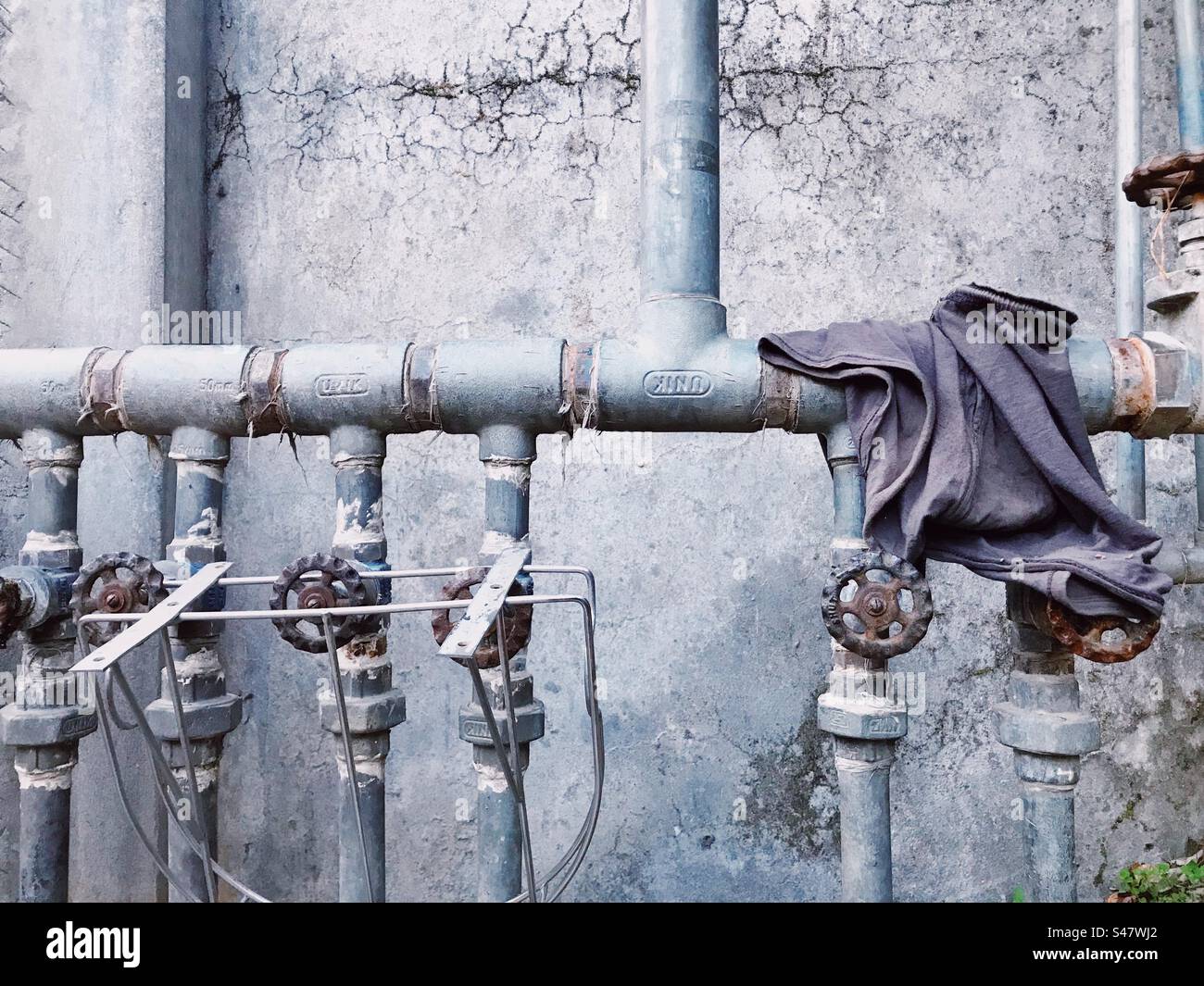 Network of pipes and taps Stock Photo Alamy
