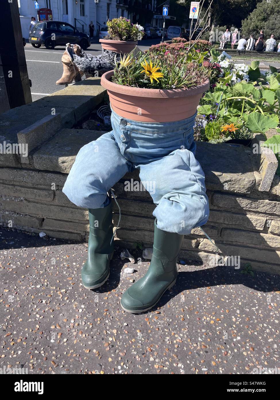 Plant pot with wellies Stock Photo Alamy