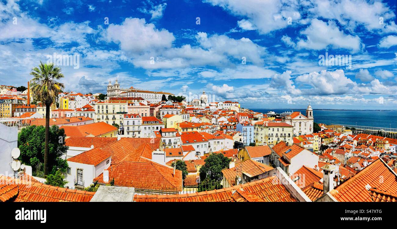 Sweeping photo of the red rooftops of the Alfama district in Lisbon Portugal Stock Photo