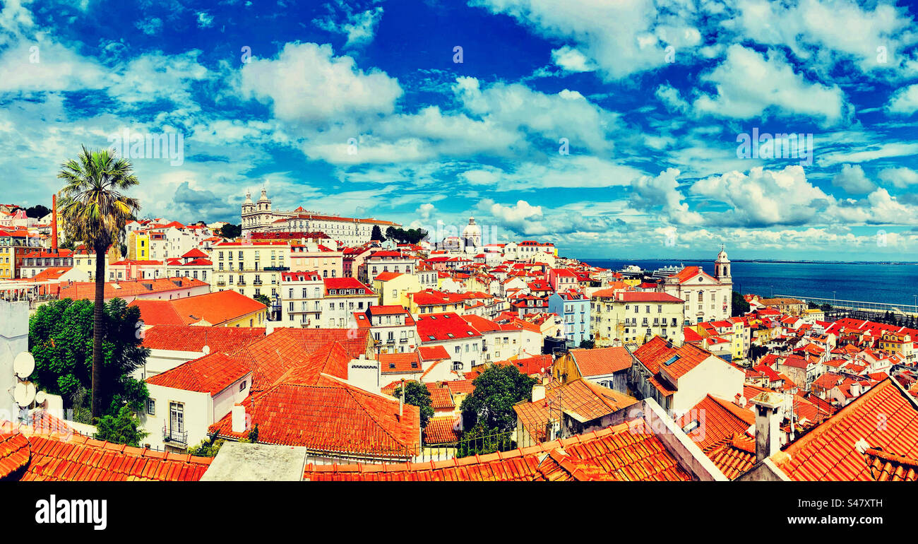 Sweeping photo of the red rooftops of the Alfama district in Lisbon Portugal Stock Photo