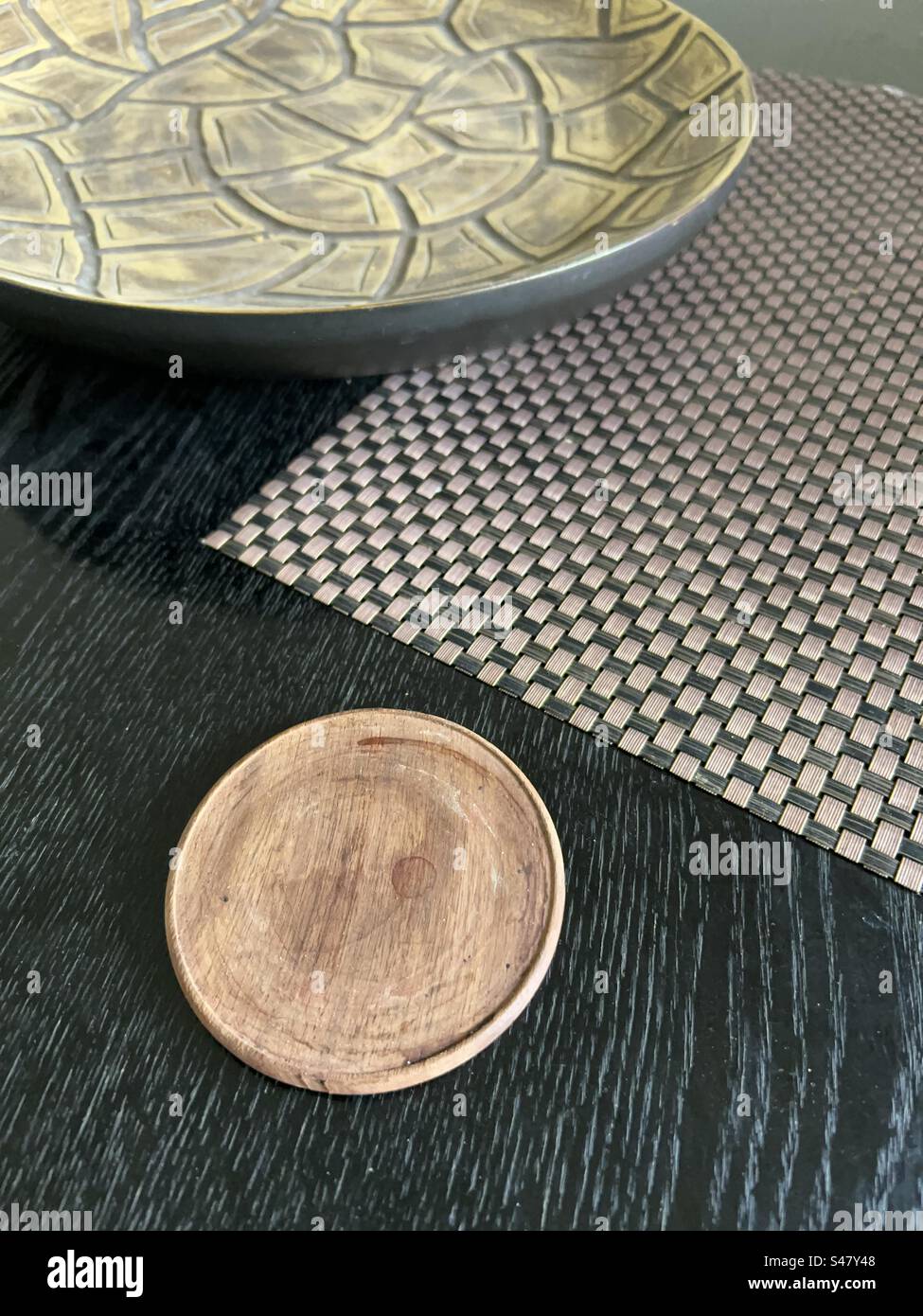 Coaster on top of a coffee table - Smartphone Captured Stock Image