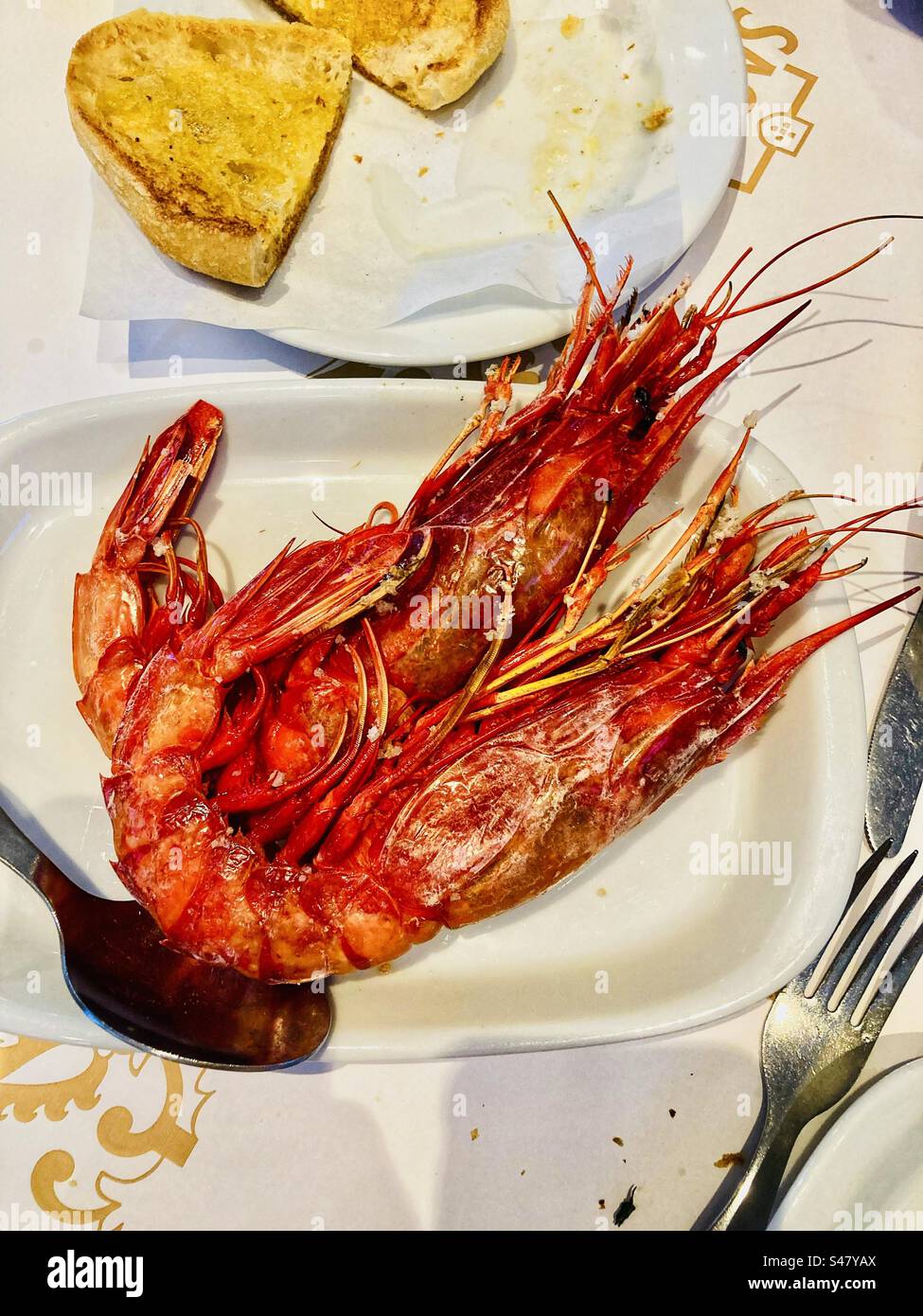 Scarlet shrimp or Cardinal Prawns ready to eat in Portugal called Carabineros - Smartphone Captured Stock Image