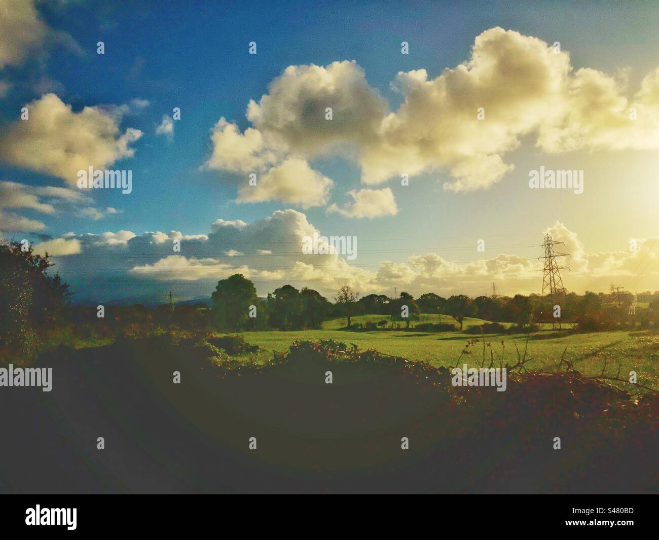 October skies with golden light lit landscape North Wales - Smartphone Captured Stock Image