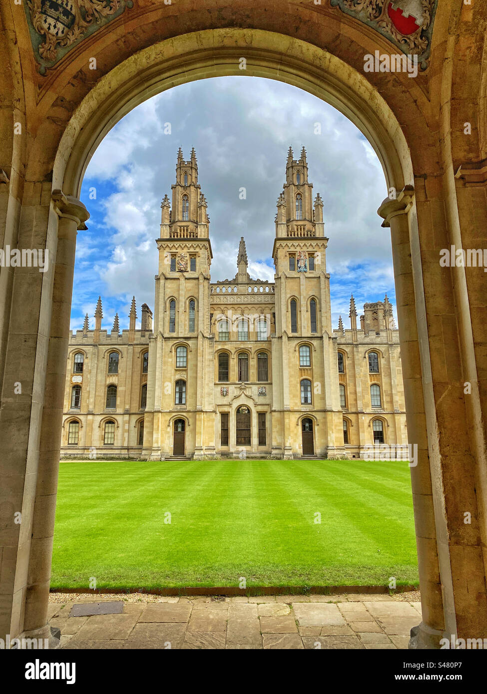 View of All Souls College in Oxford, from the Radcliffe Square Gate. An excellent view showing the Gothicised Classical Elevation. A constituent college of the University of Oxford. ©️ COLIN HOSKINS. - Smartphone Captured Stock Image