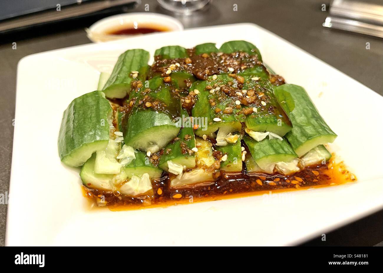 Plated Taiwanese dish of Cucumber in a spicy sauce at Din Tai Fung restaurant Stock Photo