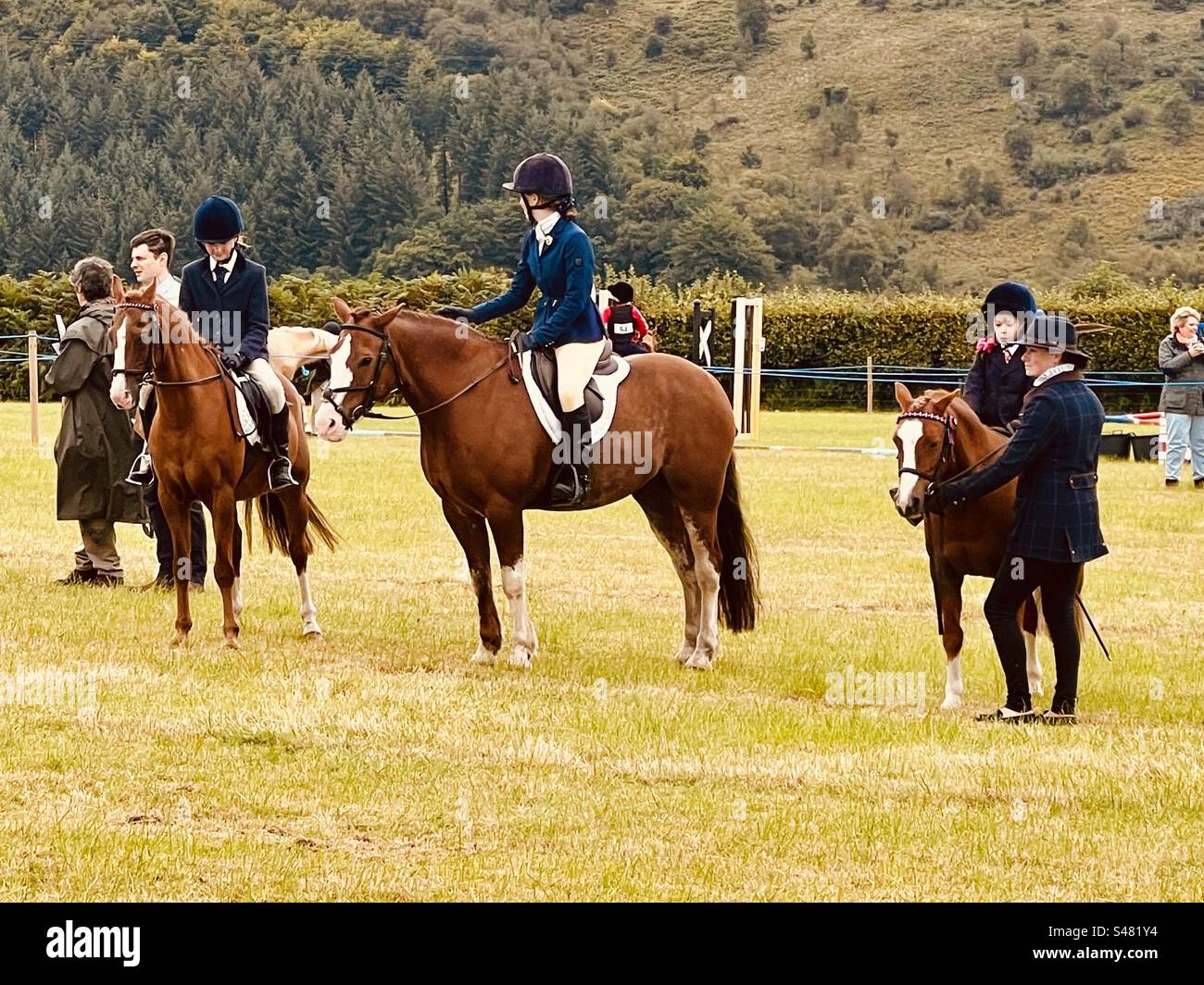 Posh English children on ponies at a countryside show Stock Photo