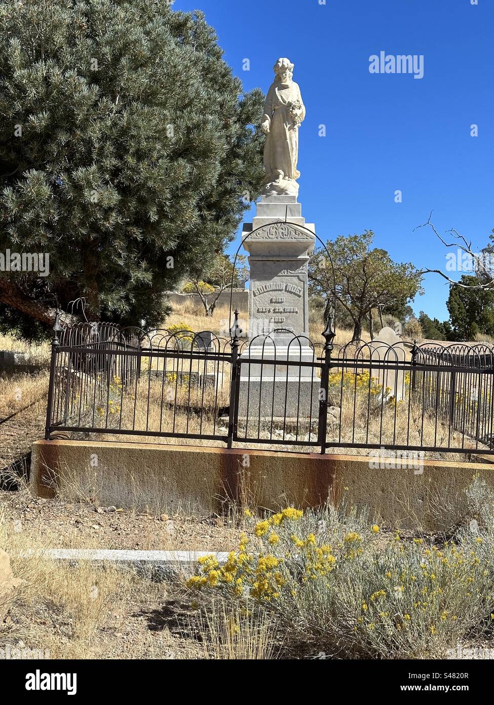 This marble monument marks the gravesite of Solomon Noel (1895) and Catherine Noel (1896) in the Masonic section of Silver Terrace Cemeteries, Virginia City, Nevada. Stock Photo