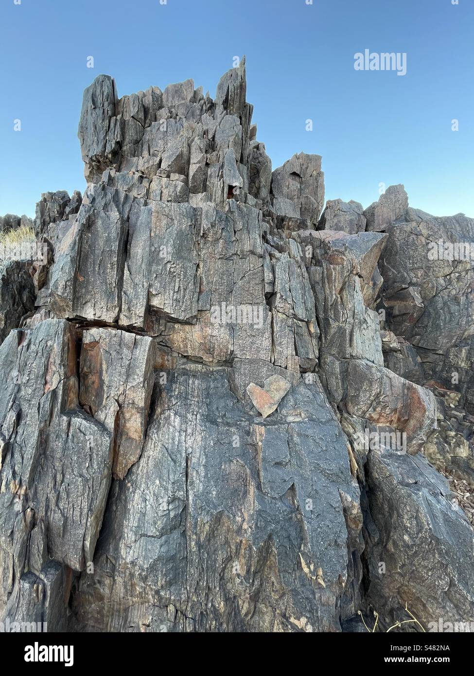Natural Stone tower, rock heart, brilliant blue sky, Phoenix Mountains Preserve, Arizona Stock Photo