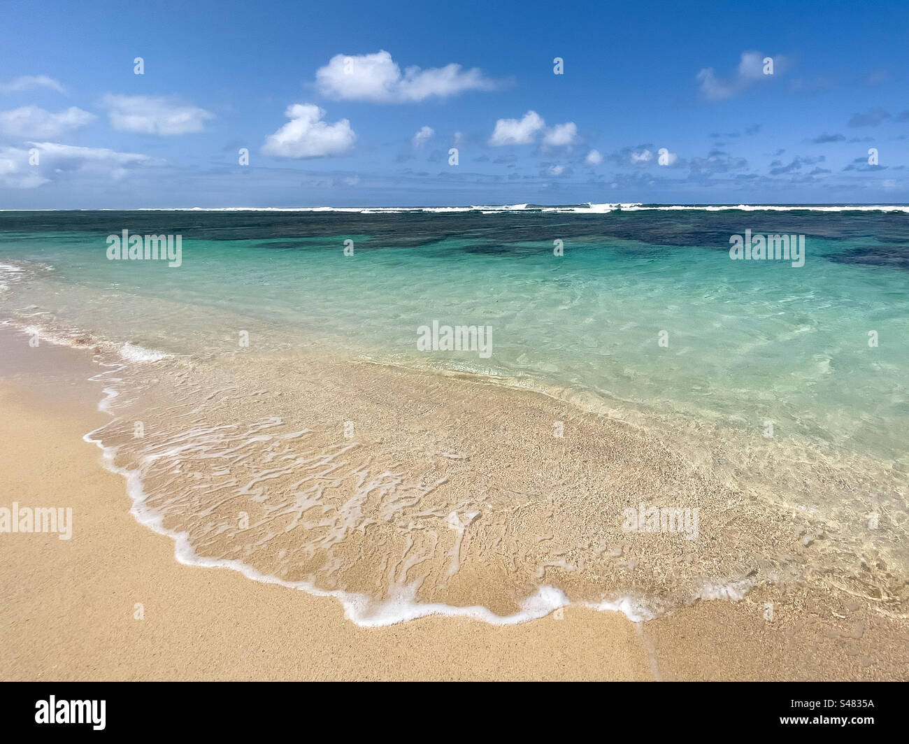 Turquoise ocean water at Riambel beach, Mauritius, East Africa - Smartphone Captured Stock Image