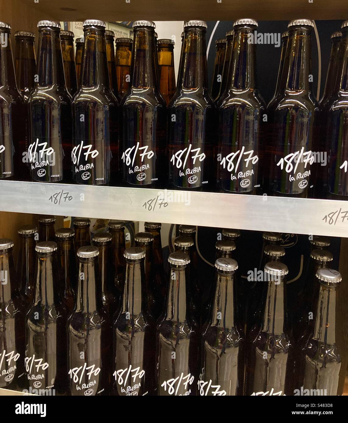 18/70 la rubia 6.2% lager bottles in a supermarket - Smartphone Captured Stock Image