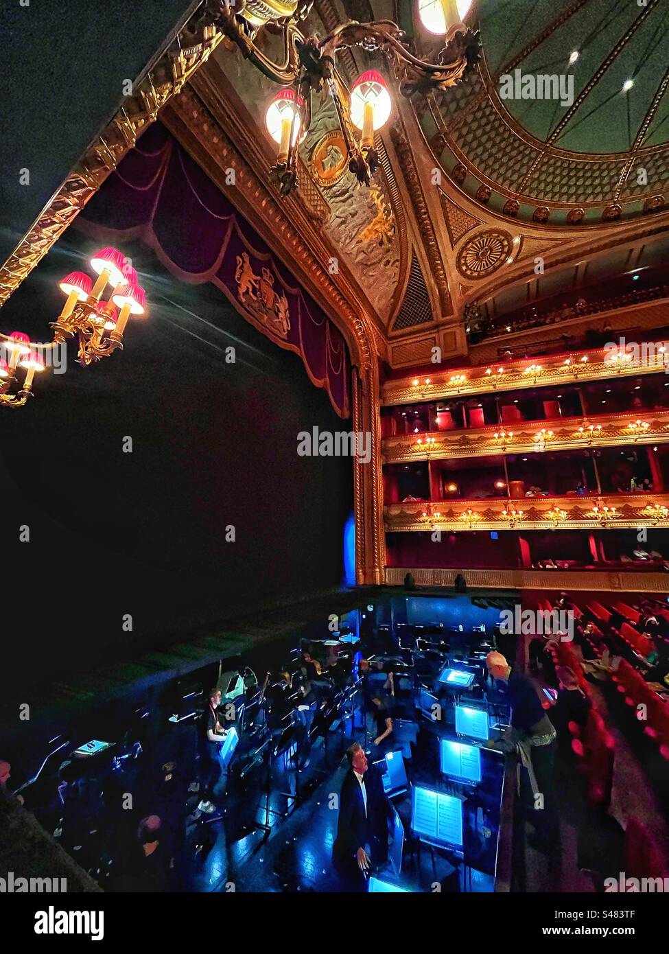 Orchestra pit, stage and boxes of the Royal Opera House in Covent Garden in London - Smartphone Captured Stock Image