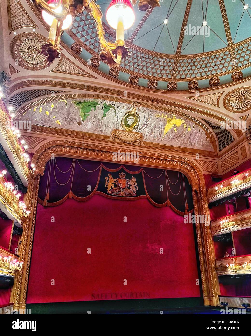The stage with the Royal coat of arms at The Royal Opera House in Covent Garden, London - Smartphone Captured Stock Image
