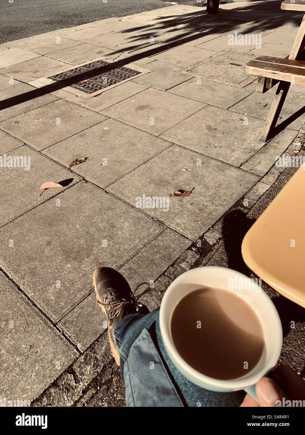 Having a mug of tea in the late afternoon sun. - Smartphone Captured Stock Image