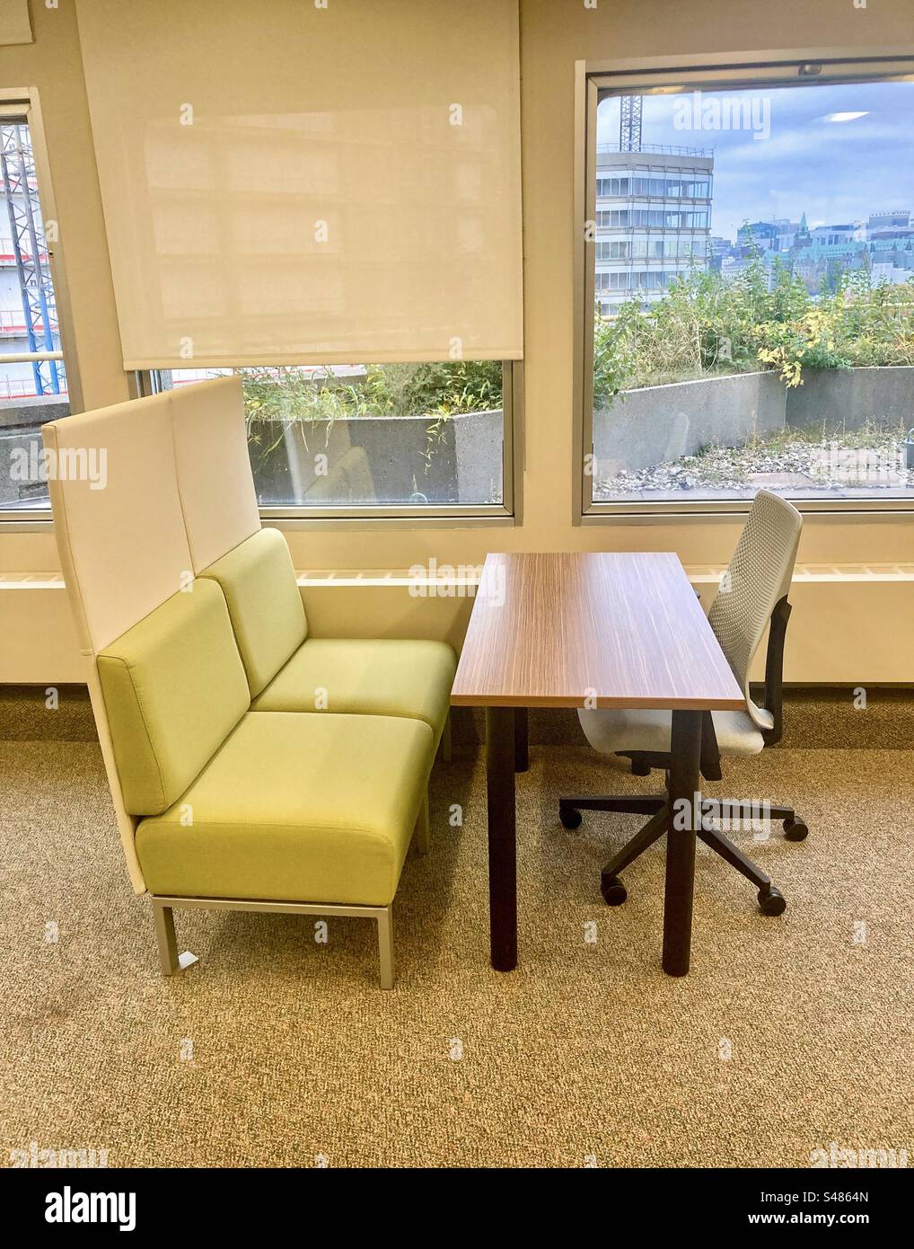 A modern office space early in the morning. - Smartphone Captured Stock Image