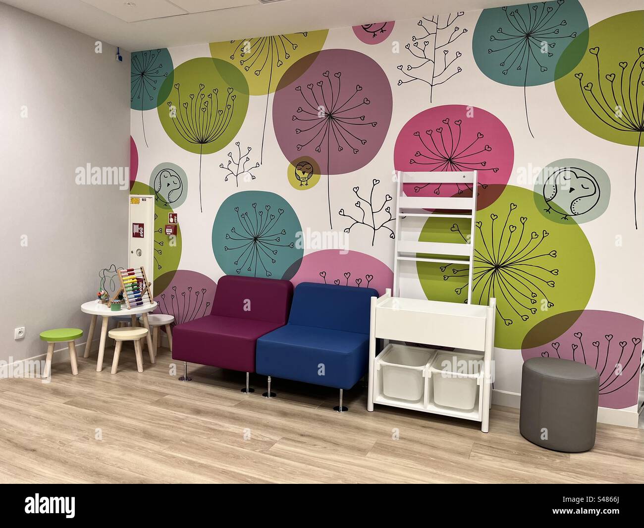 Colourful kid’s area waiting room in modern LuxMed medical centre interior in Gdansk, Poland, Europe, EU - Smartphone Captured Stock Image