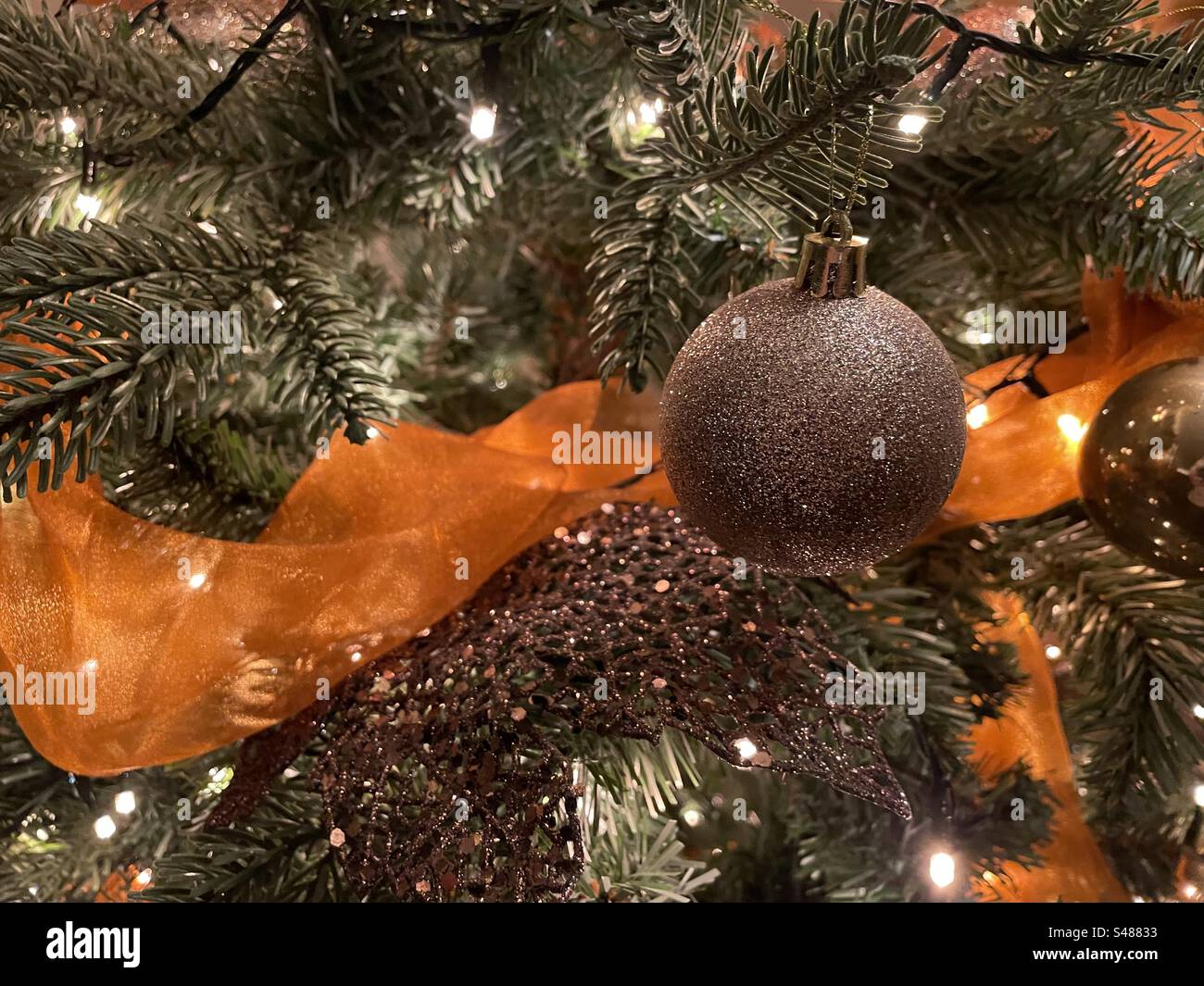Christmas decorations on a Christmas Tree Stock Photo